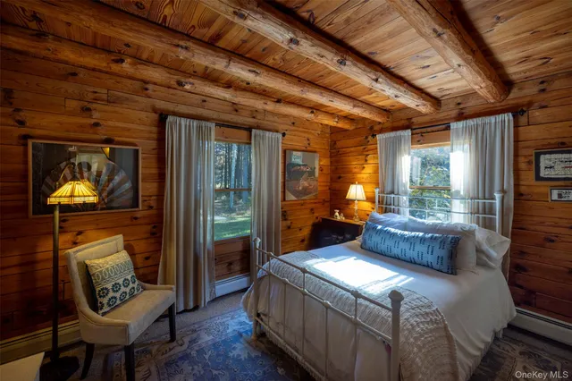 a bathroom with a shower and a sink