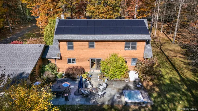 a fire hydrant in front of a tree