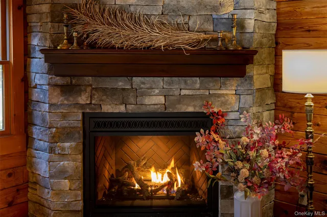 a view of a dining room with furniture wooden floor and chandelier