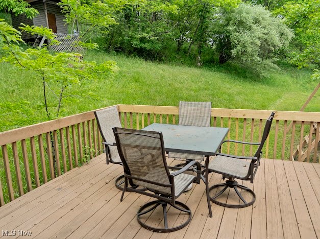 631 Short Brook Road Vincent, OH 45784 - Photo 9 of 31 Deck featuring outdoor dining space and central AC