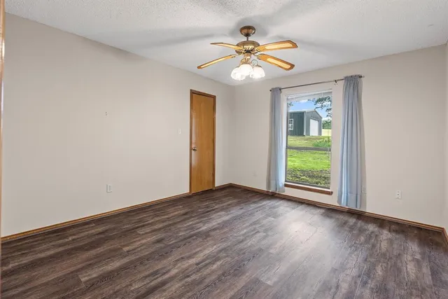 a bathroom with a double vanity sink a mirror and a shower