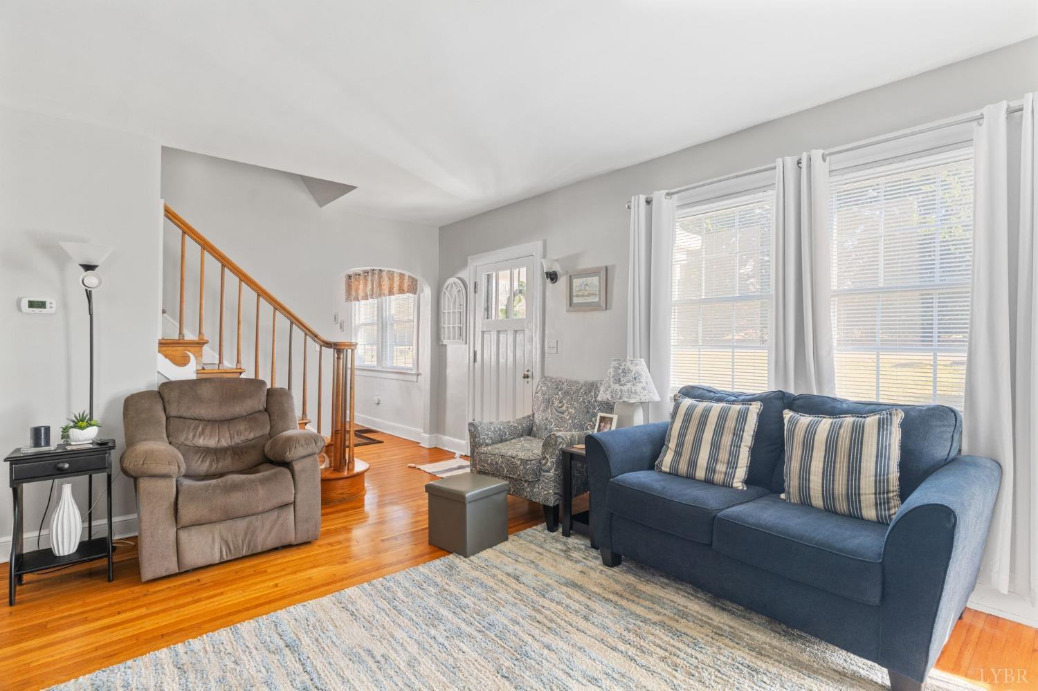 133 Ridge Drive Amherst, VA 24521 - Photo 18 of 61 a living room with furniture wooden floor and a large window