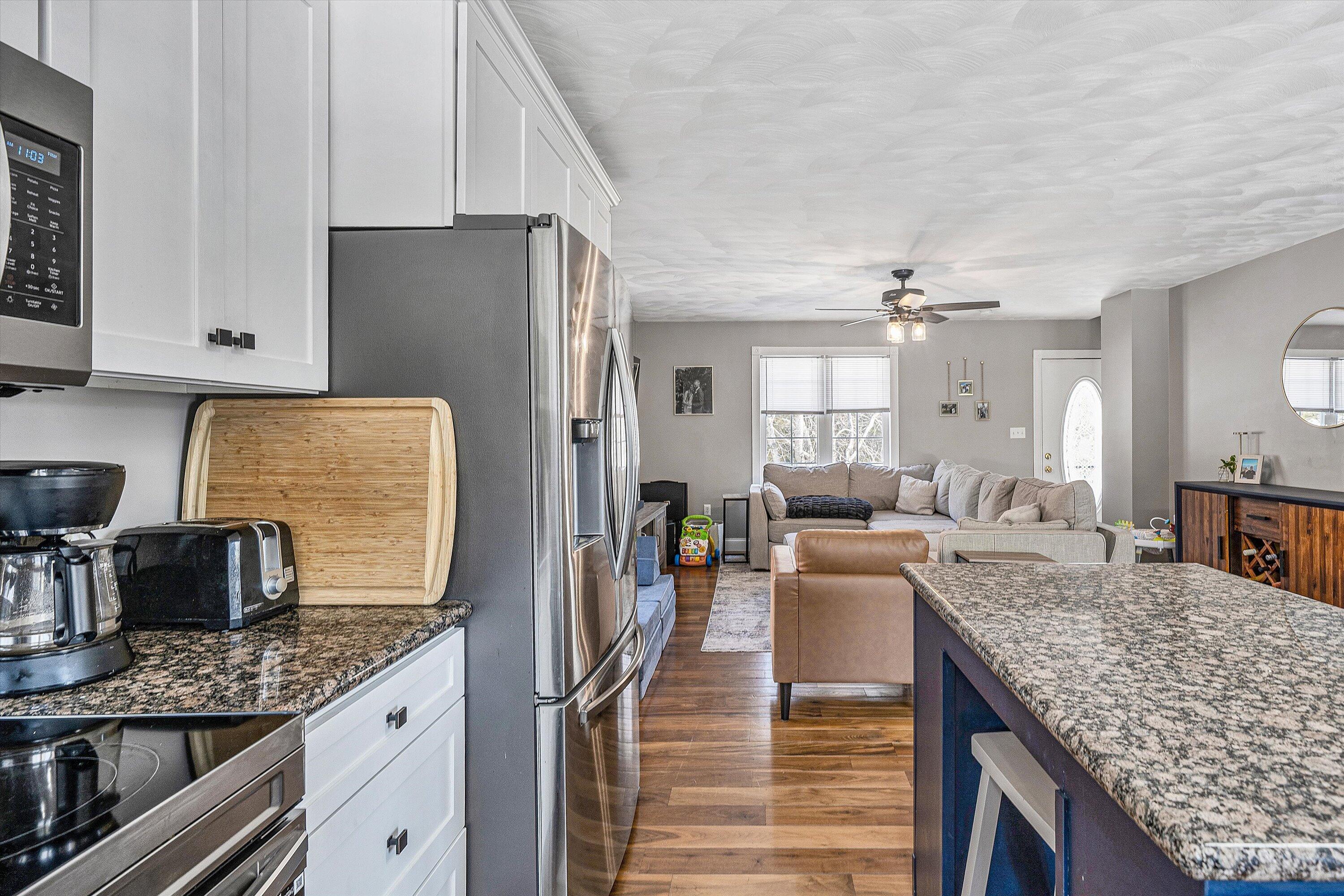409 Wills Road Lexington, VA 24450 - Photo 15 of 42 a kitchen with granite countertop lots of counter top space and refrigerator