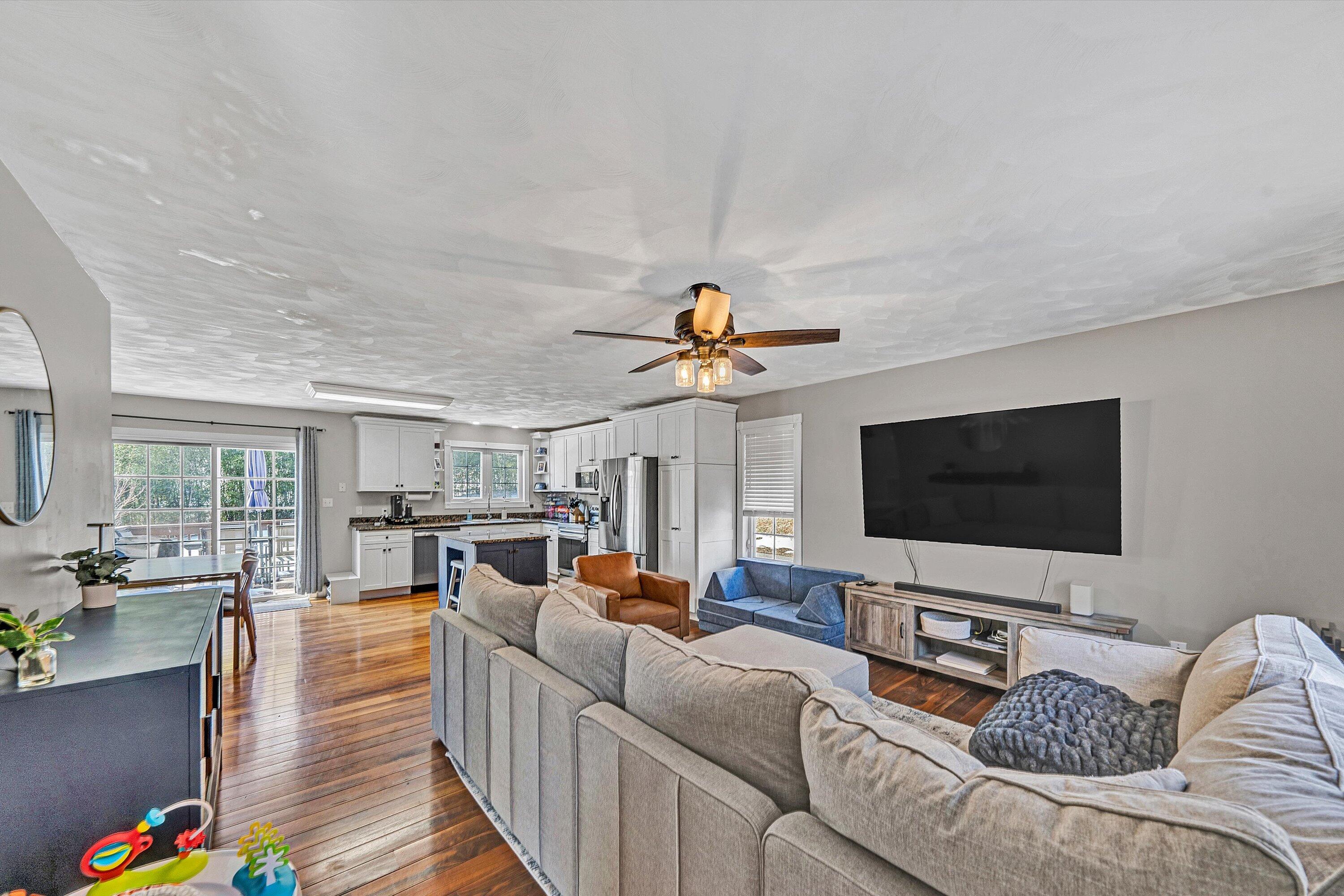 409 Wills Road Lexington, VA 24450 - Photo 5 of 42 a living room with furniture and a flat screen tv