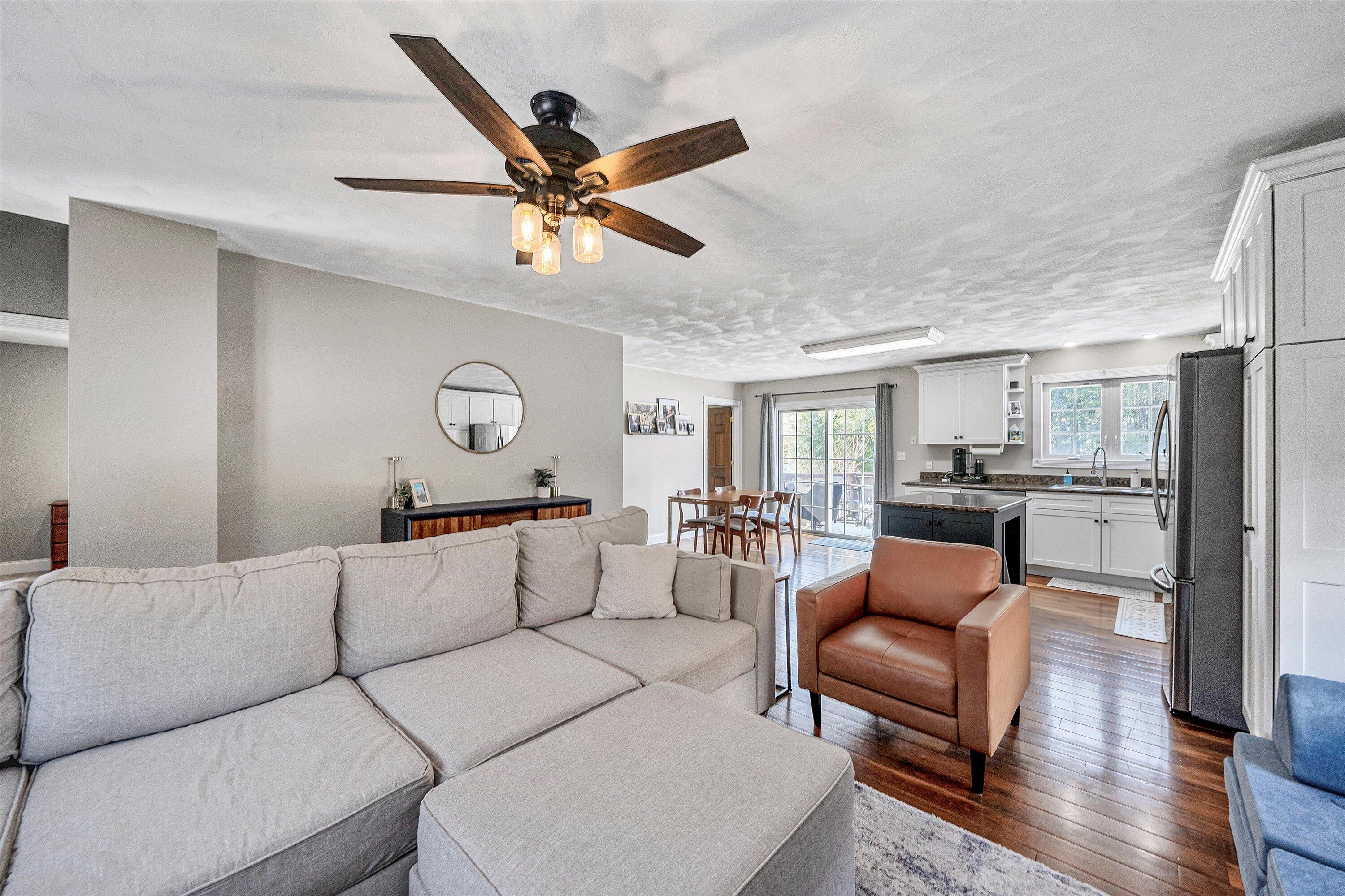 409 Wills Road Lexington, VA 24450 - Photo 6 of 42 a living room with furniture and kitchen view
