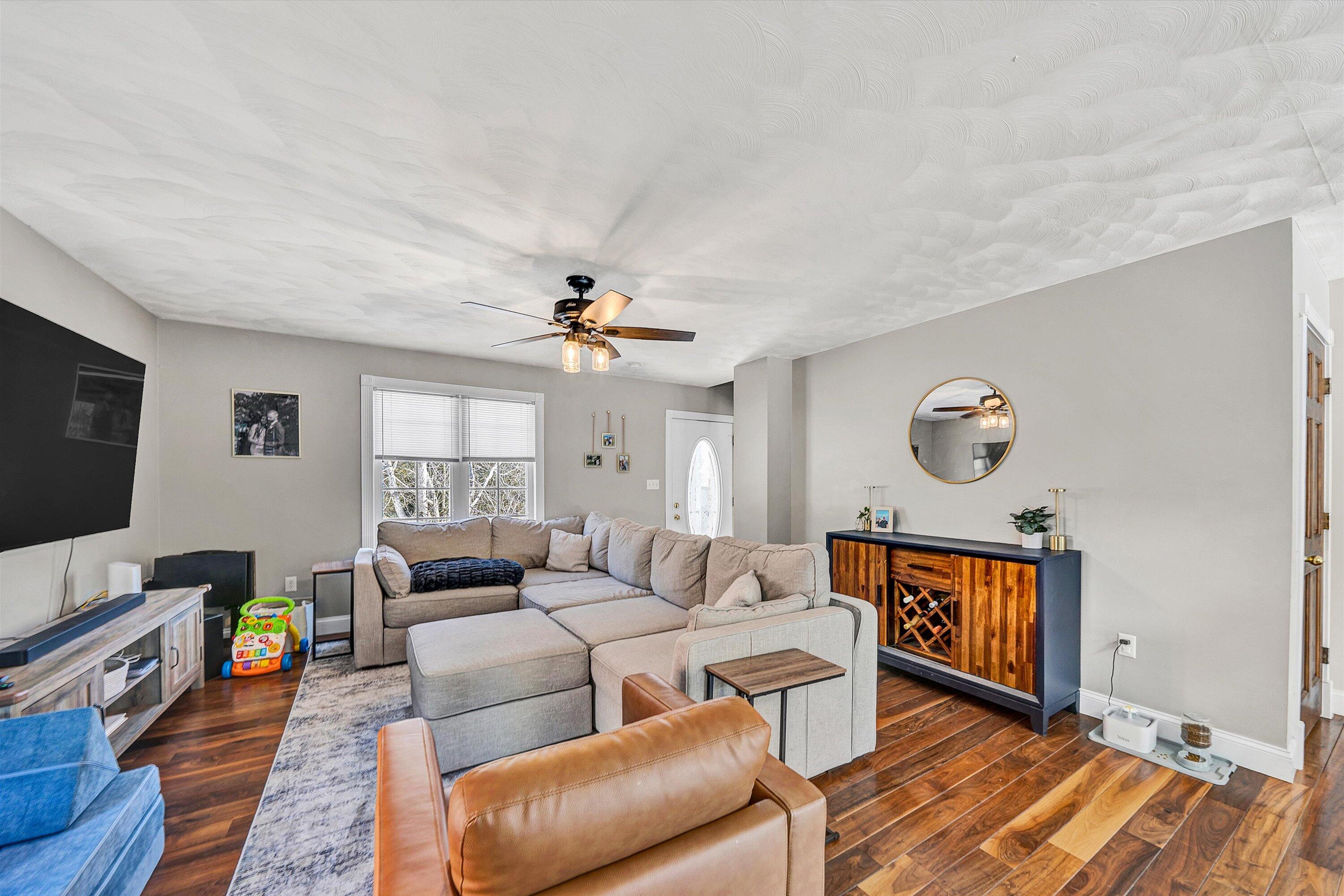 409 Wills Road Lexington, VA 24450 - Photo 7 of 42 a living room with furniture and a flat screen tv