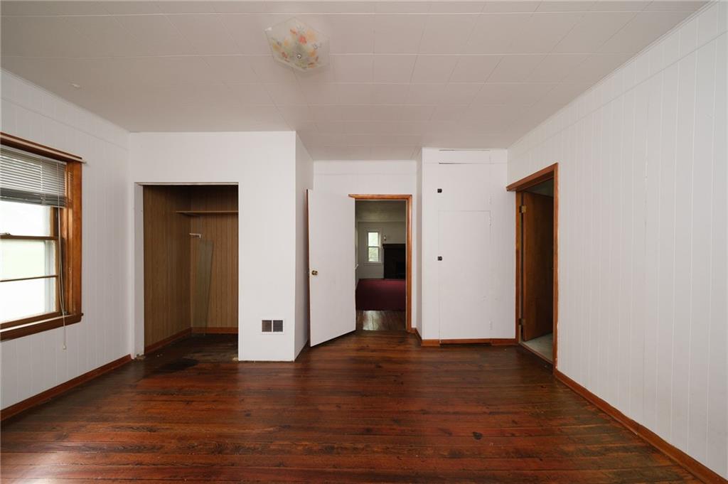 1286 Highway 30 Clinton, PA 15026 - Photo 14 of 23 a view of an empty room with wooden floor and closet