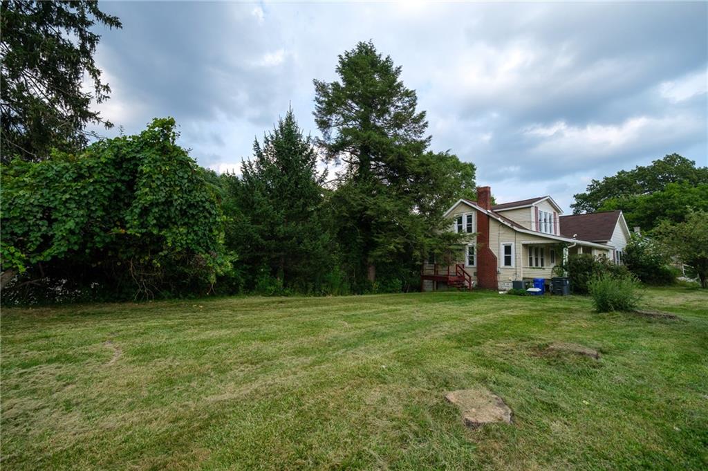 1286 Highway 30 Clinton, PA 15026 - Photo 21 of 23 a view of a house with a yard