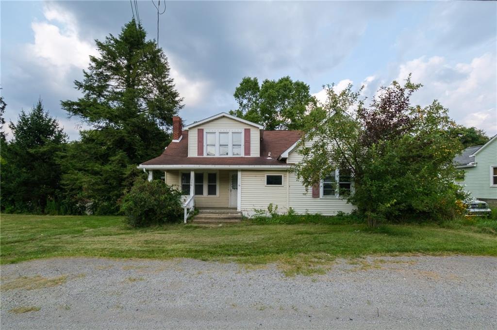 1286 Highway 30 Clinton, PA 15026 - Photo 22 of 23 a front view of a house with garden