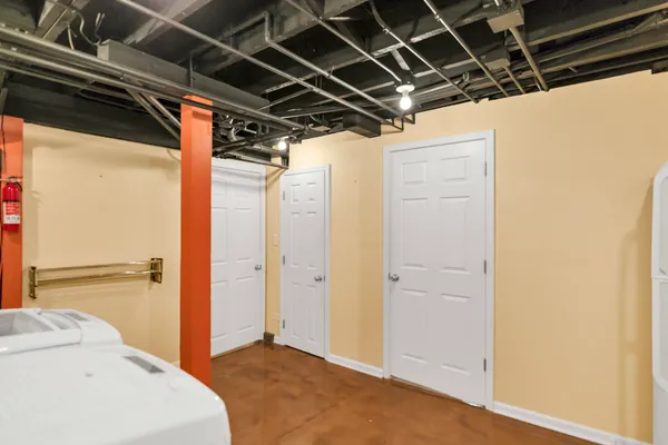 a view of an empty room with a balcony