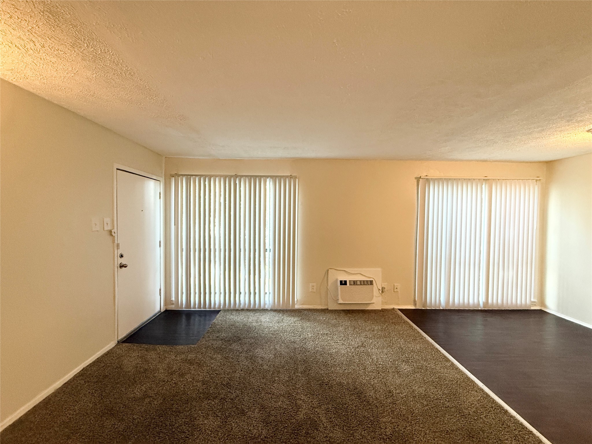 3629 North MacGregor Way, Unit 3 Houston, TX 77004 - Photo 4 of 14 an empty room with windows
