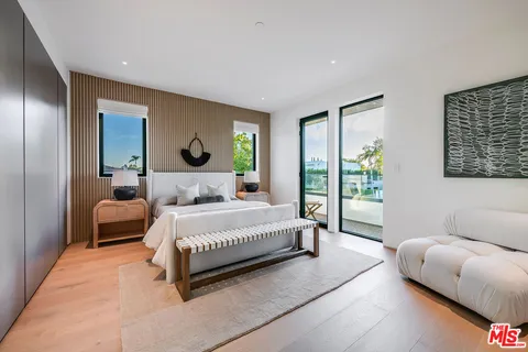 a bathroom with a toilet a sink and bathtub