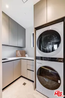 a balcony with furniture and city view