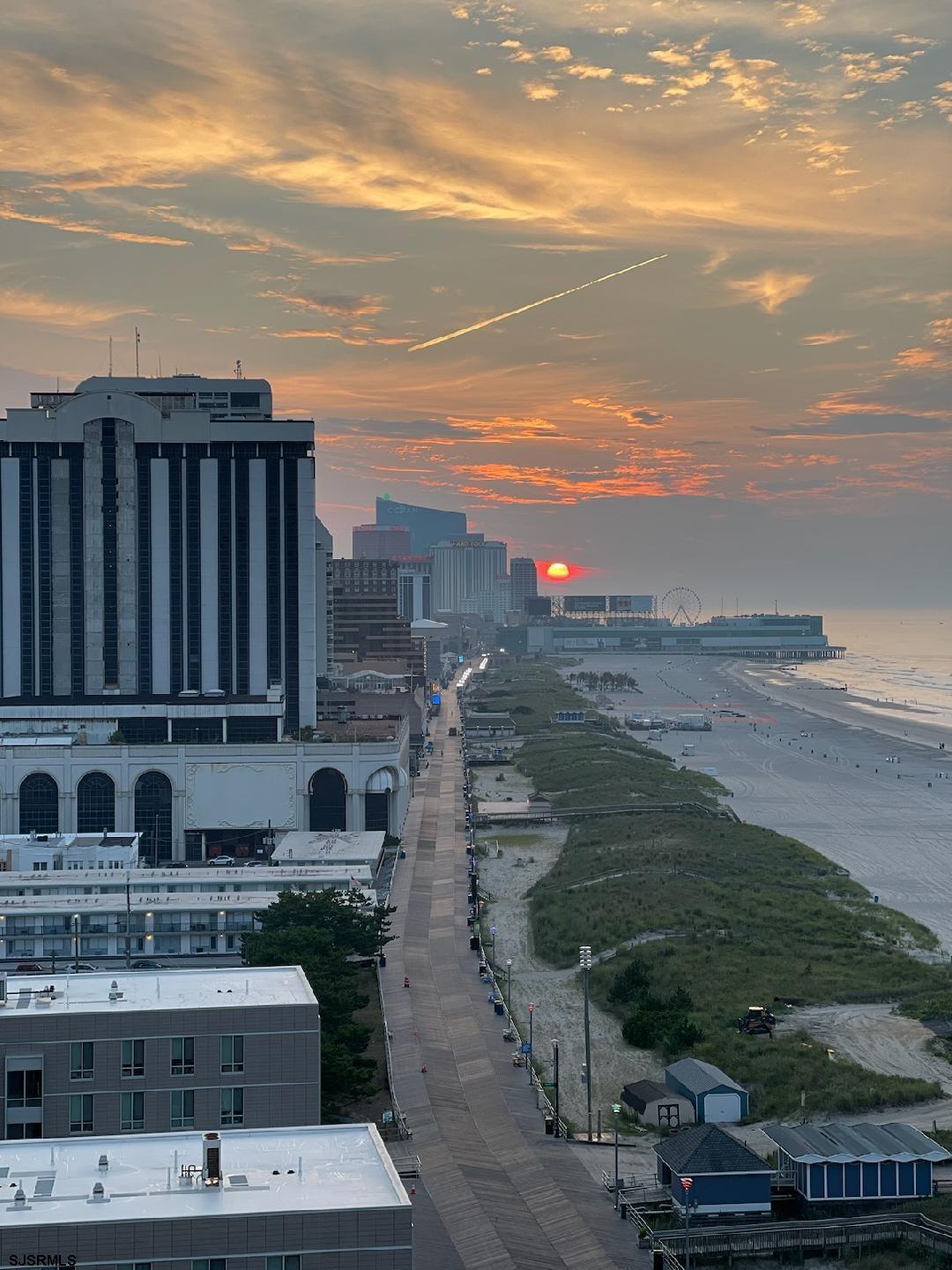 3851 Boardwalk, Unit 1405 Atlantic City, NJ 08401 - Photo 14 of 36 a view of a patio with wooden fencing