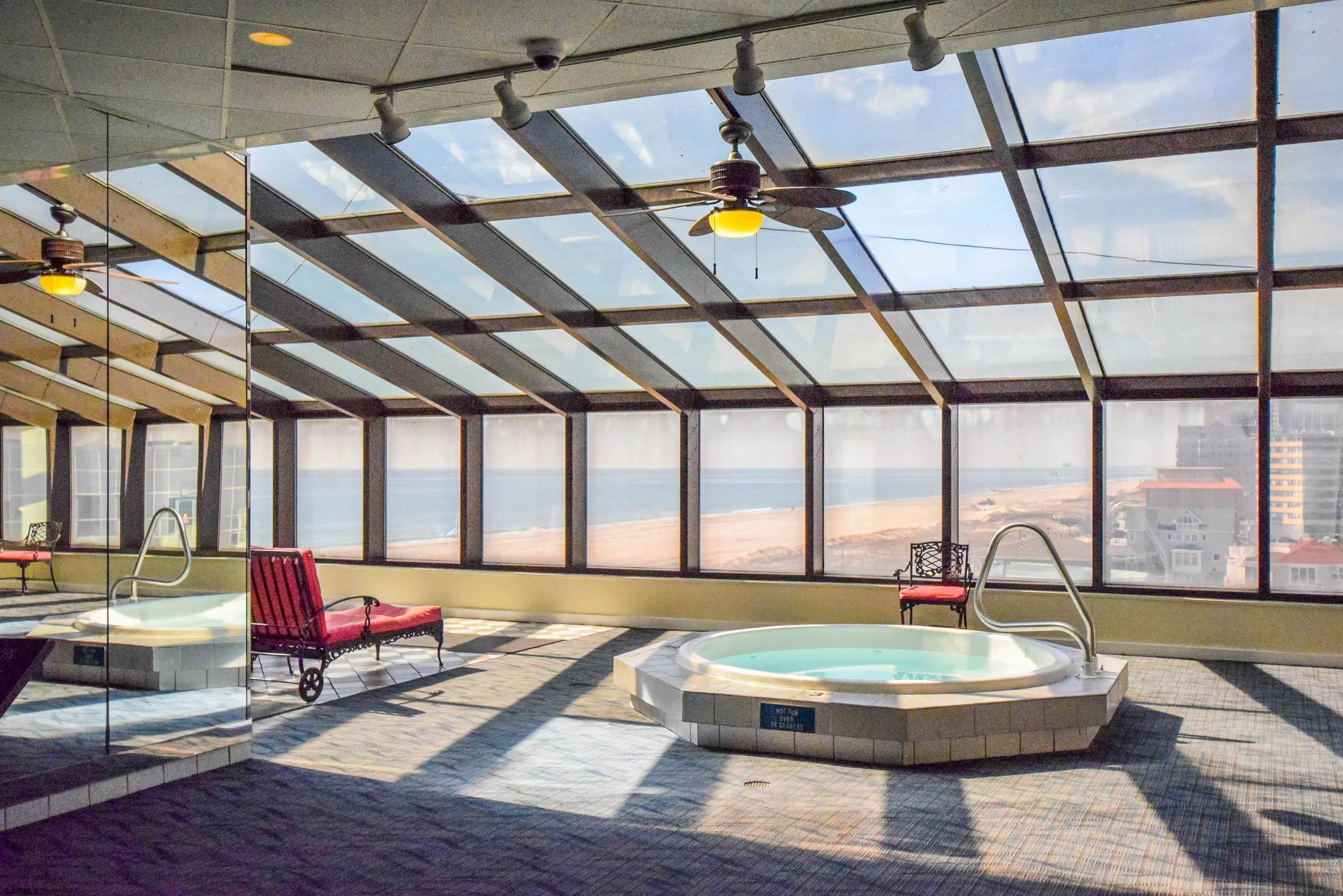 3851 Boardwalk, Unit 1405 Atlantic City, NJ 08401 - Photo 23 of 36 a living room with furniture and a large window