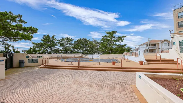 a view of a terrace with lake view