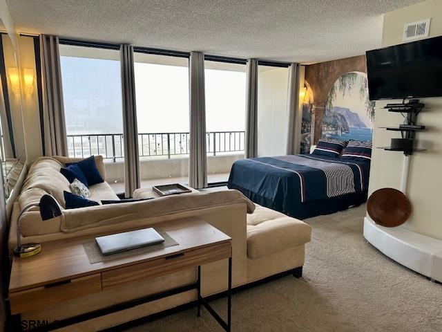 3851 Boardwalk, Unit 1405 Atlantic City, NJ 08401 - Photo 5 of 36 a living room with furniture fireplace and a flat screen tv