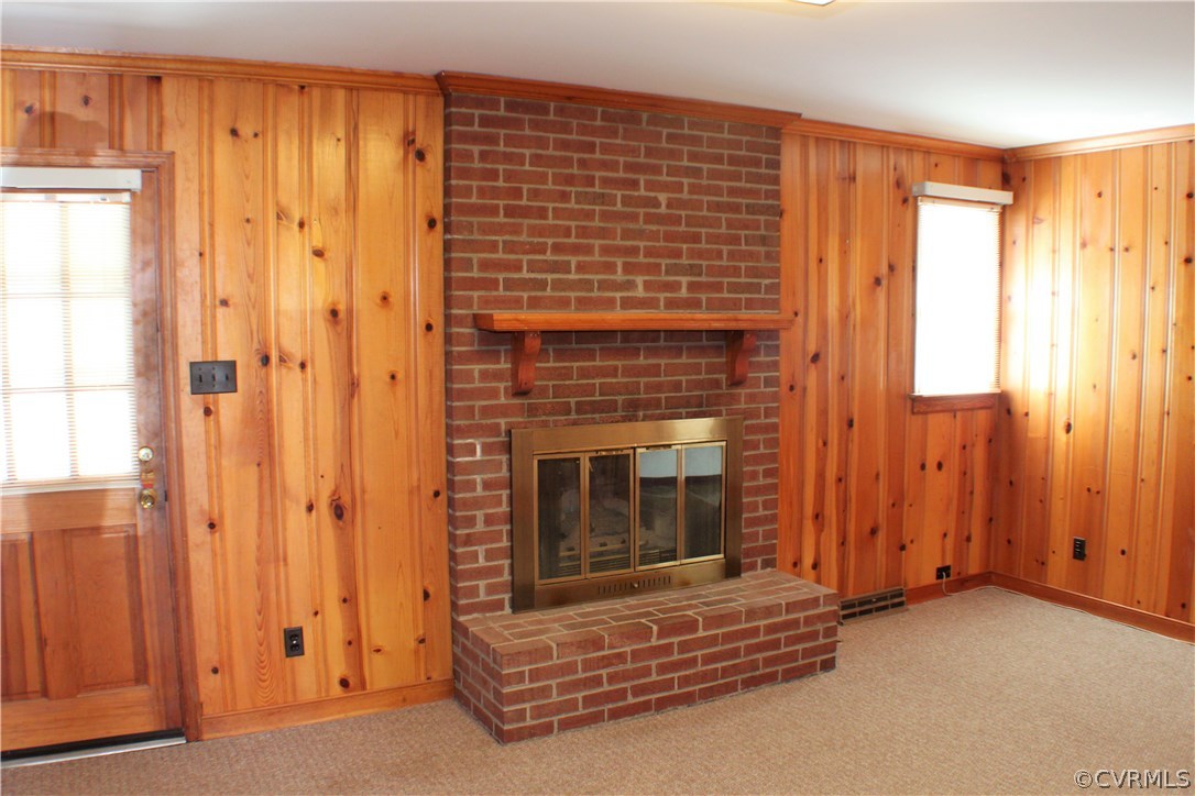 9931 Trebeck Road Chesterfield, VA 23236 - Photo 13 of 43 a living room with a fireplace