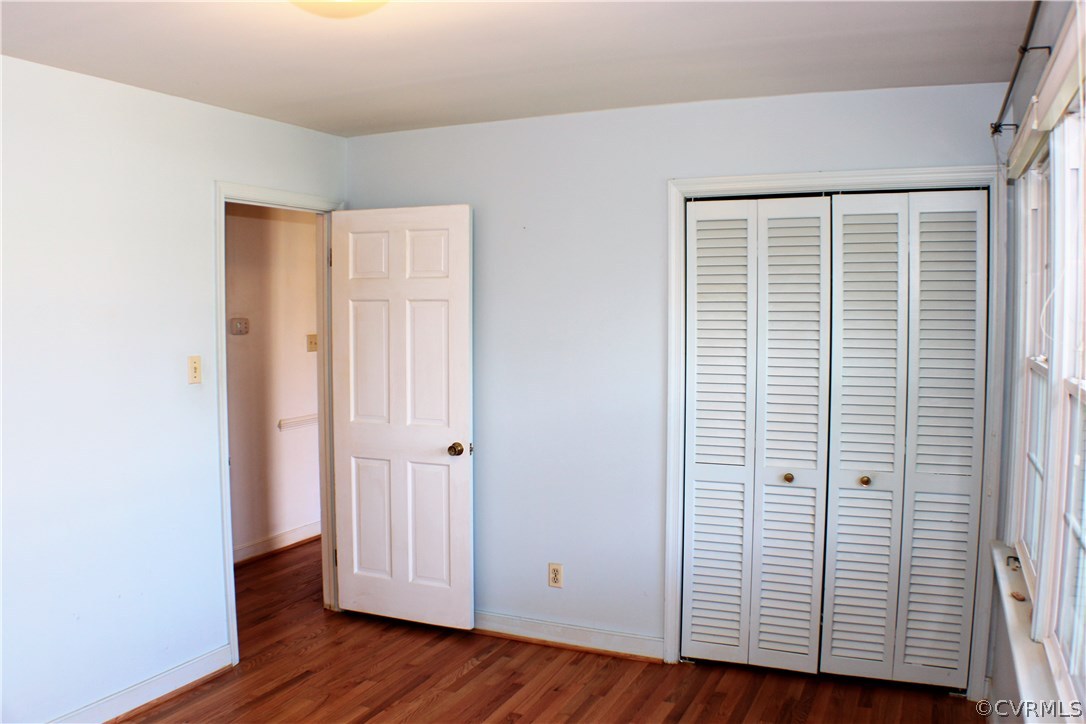 9931 Trebeck Road Chesterfield, VA 23236 - Photo 19 of 43 an empty room with wooden floor and closet