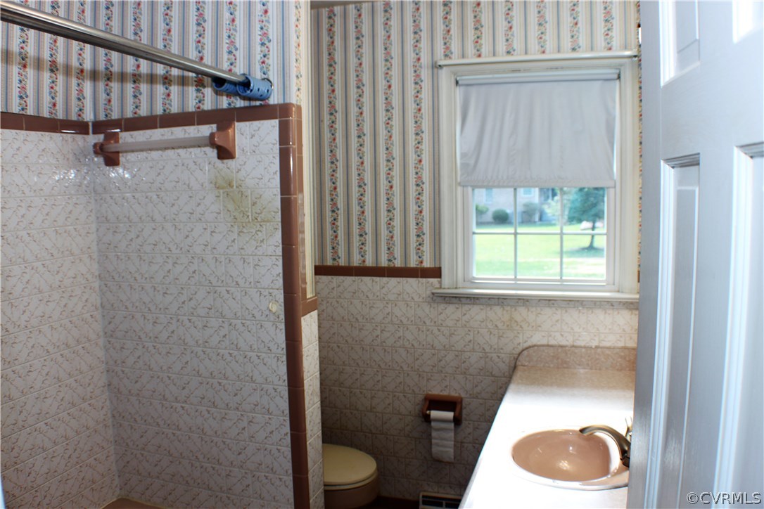 9931 Trebeck Road Chesterfield, VA 23236 - Photo 20 of 43 a bathroom with a toilet and a sink