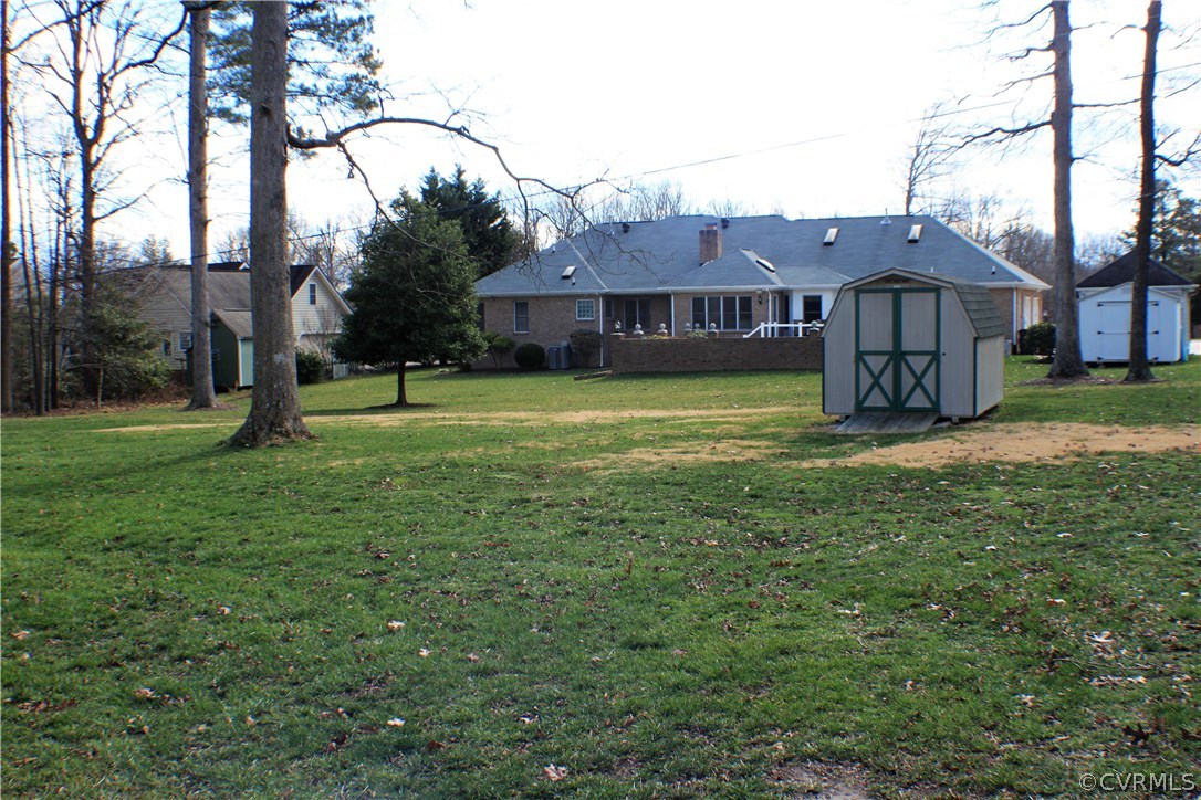 9931 Trebeck Road Chesterfield, VA 23236 - Photo 30 of 43 a house view with a garden space