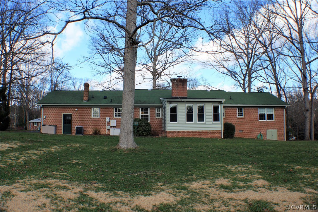 9931 Trebeck Road Chesterfield, VA 23236 - Photo 32 of 43 front view of a house with a yard