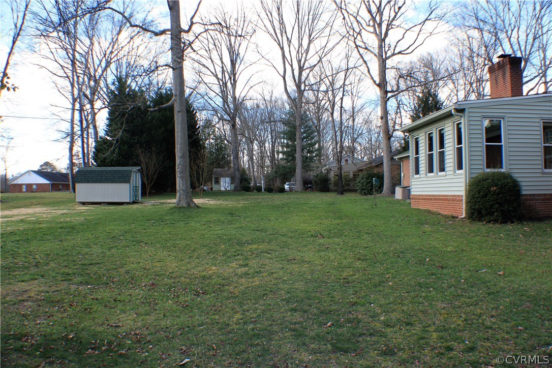 9931 Trebeck Road Chesterfield, VA 23236 - Photo 34 of 43 a view of a house with backyard and sitting area
