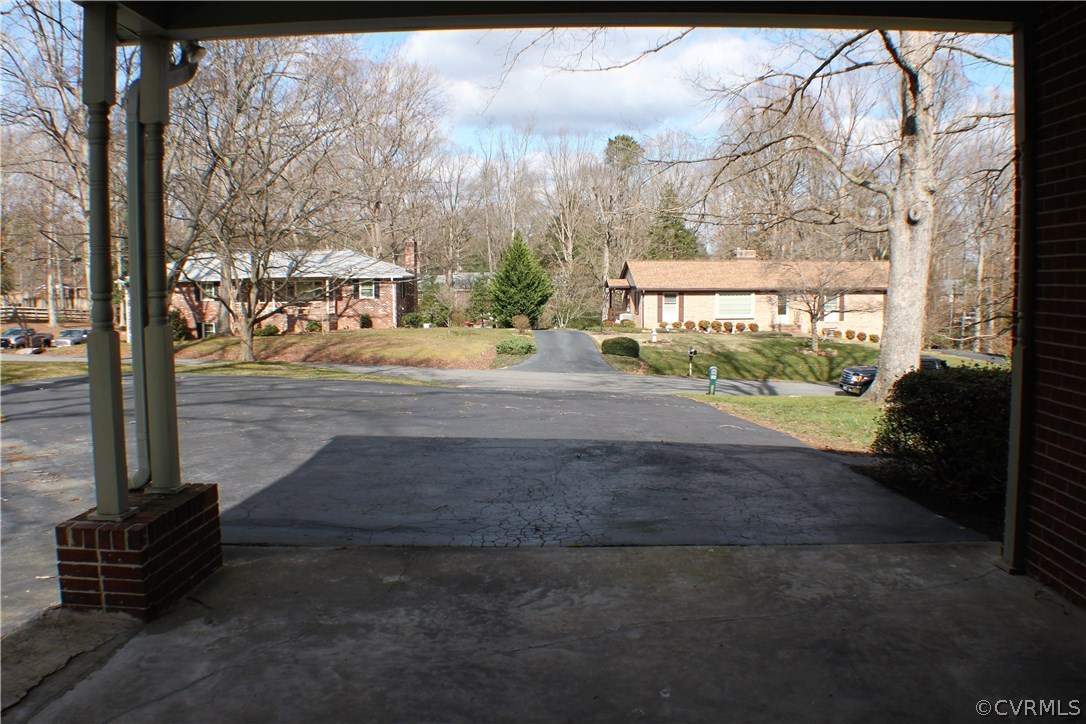 9931 Trebeck Road Chesterfield, VA 23236 - Photo 38 of 43 a view of a street with a building in the background