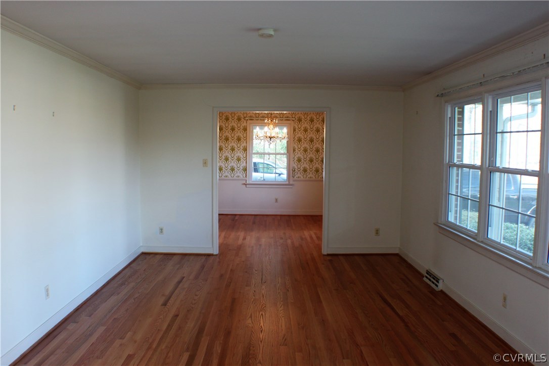 9931 Trebeck Road Chesterfield, VA 23236 - Photo 4 of 43 an empty room with wooden floor and windows