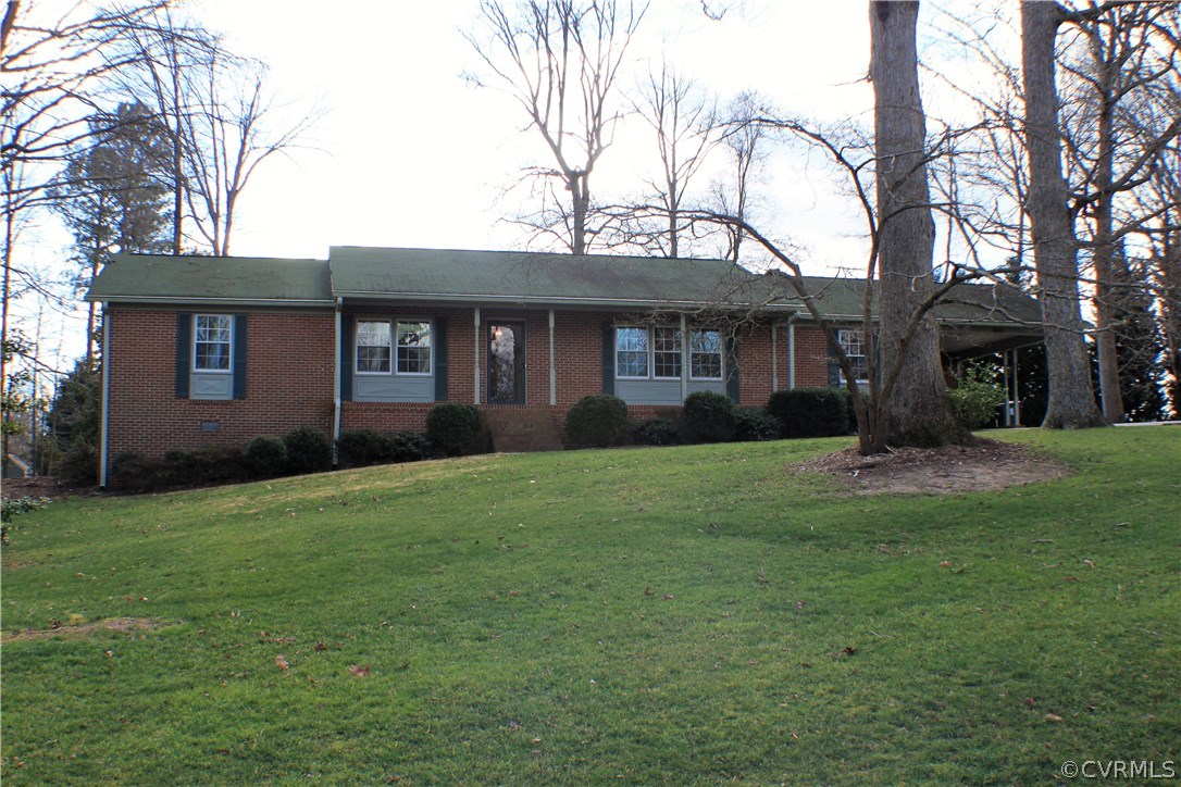 9931 Trebeck Road Chesterfield, VA 23236 - Photo 41 of 43 a front view of house with yard and green space