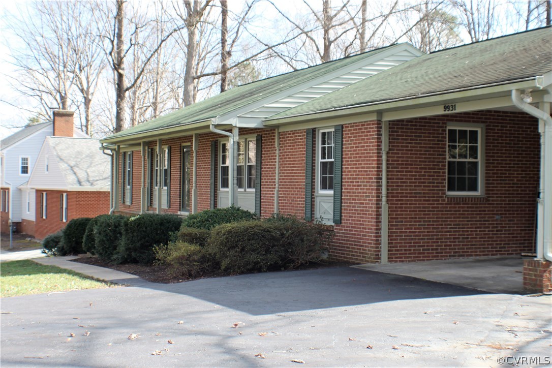 9931 Trebeck Road Chesterfield, VA 23236 - Photo 42 of 43 a view of a house with a yard