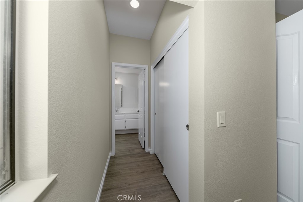 32465 Cape Cod Drive Lake Elsinore, CA 92530 - Photo 14 of 29 a view of a bathroom from a hallway