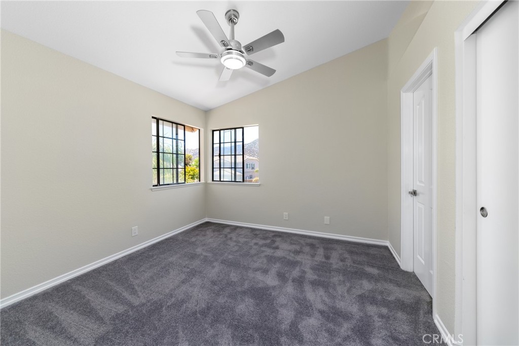 32465 Cape Cod Drive Lake Elsinore, CA 92530 - Photo 18 of 29 a view of an empty room with a window
