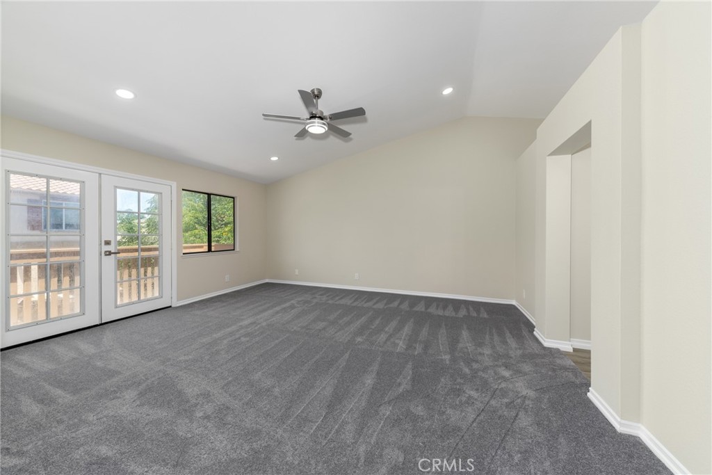 32465 Cape Cod Drive Lake Elsinore, CA 92530 - Photo 21 of 29 wooden floor in an empty room with a window
