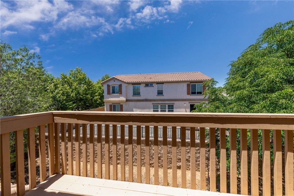 32465 Cape Cod Drive Lake Elsinore, CA 92530 - Photo 26 of 29 a view of a wooden roof deck