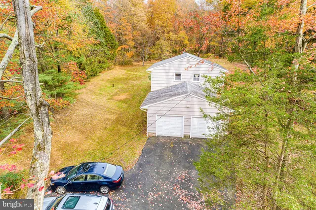 a view of car parked on the side of a road