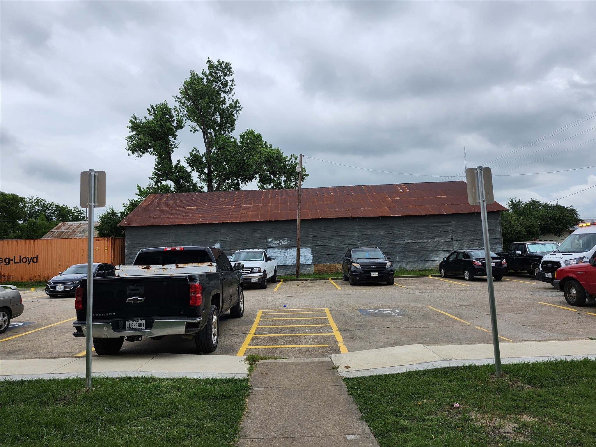 306 West Avenue D Rosebud, TX 76570 - Photo 3 of 8 a car parked in front of a house