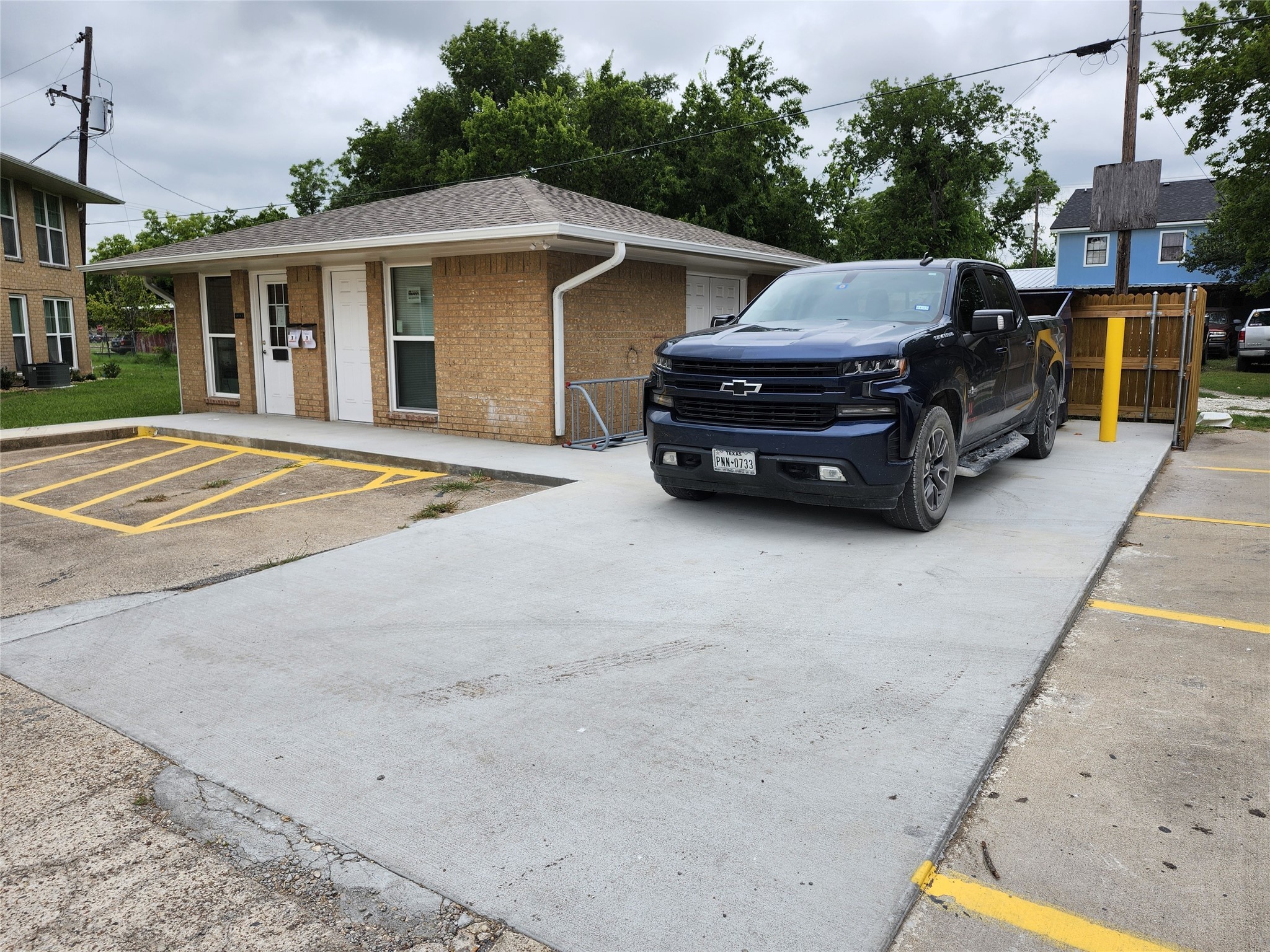 306 West Avenue D Rosebud, TX 76570 - Photo 6 of 8 a house view with a backyard space