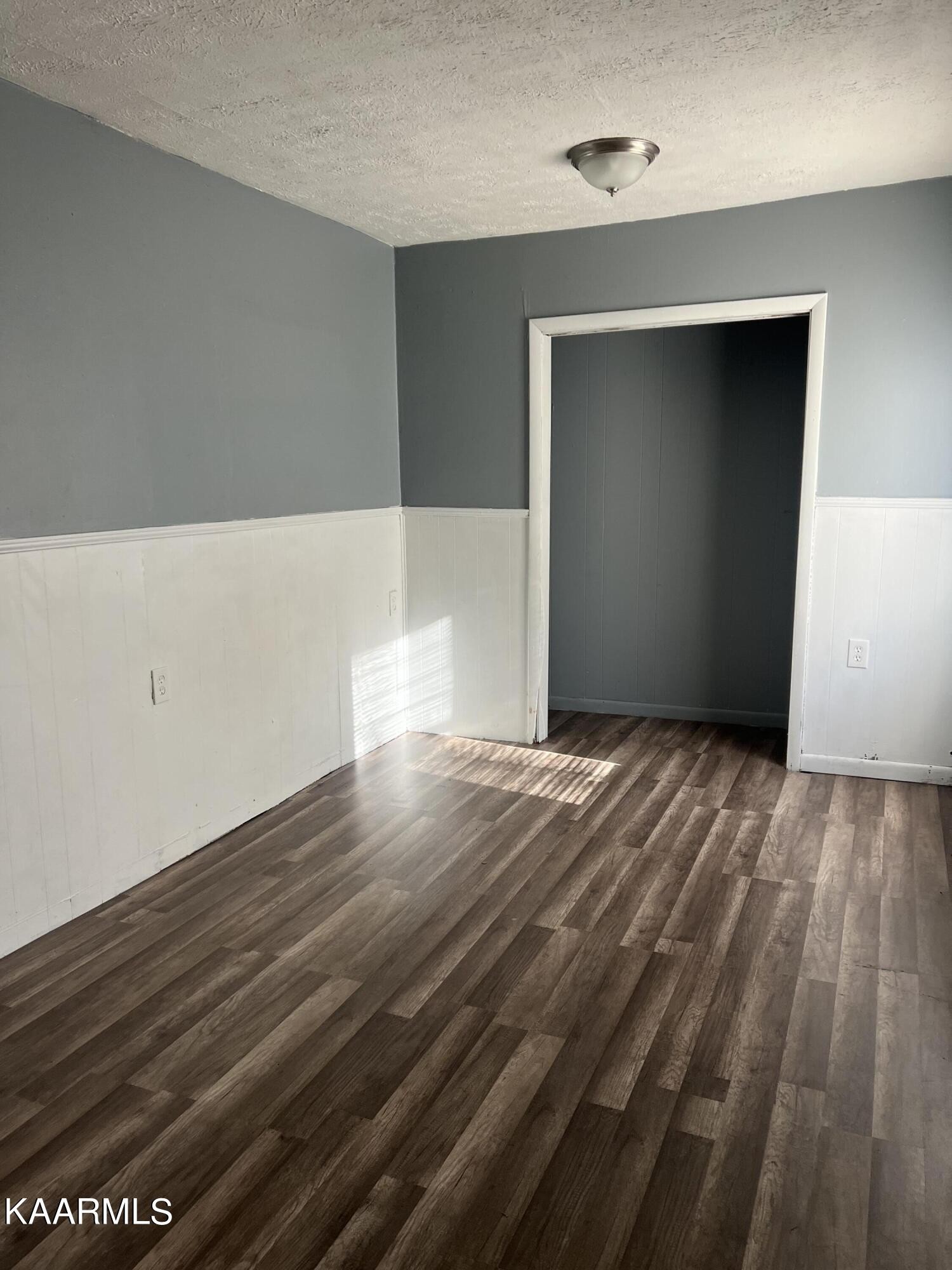 542 Sweetwater Road Philadelphia, TN 37846 - Photo 6 of 6 a view of an empty room with wooden floor and closet