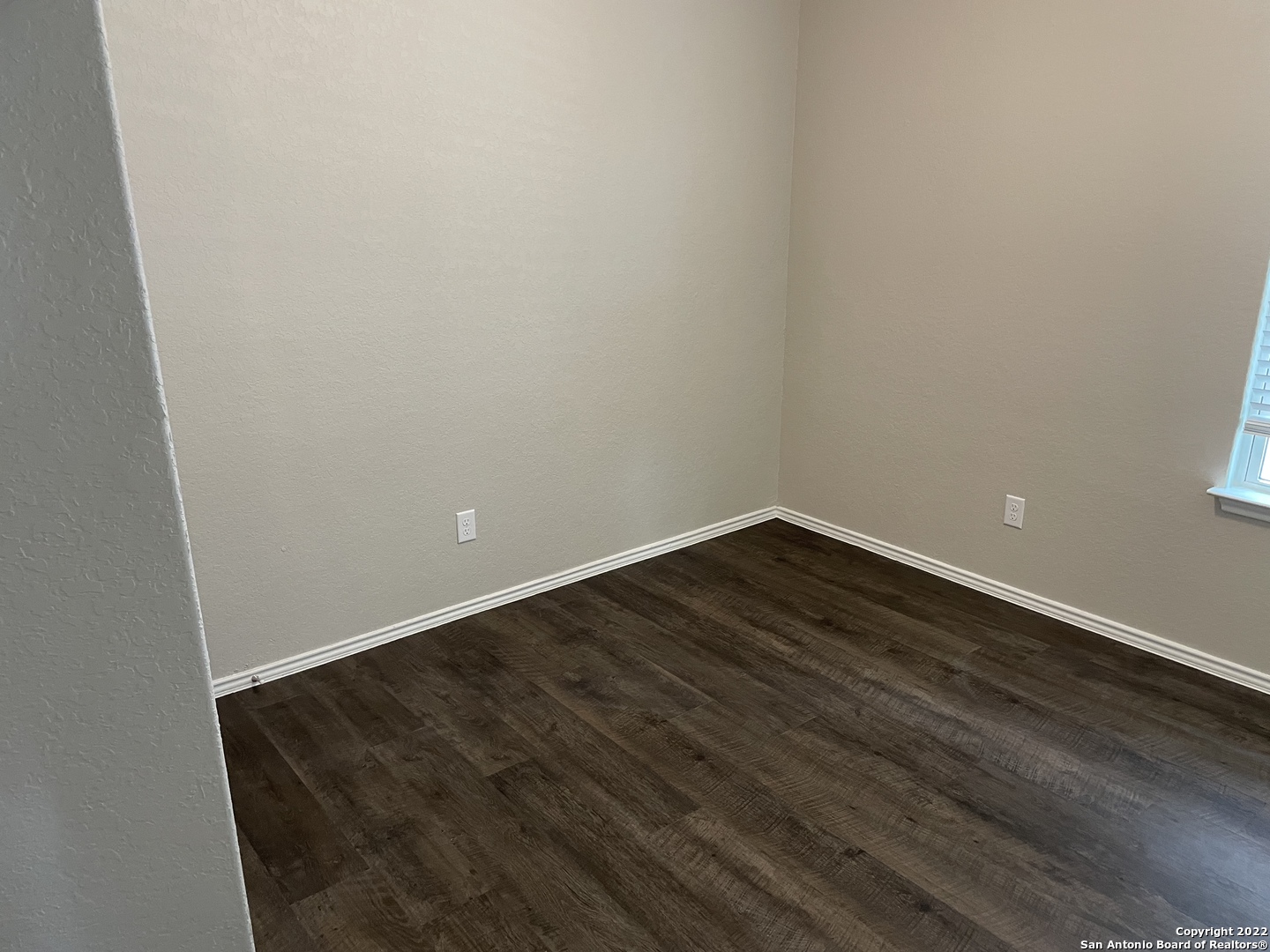 12904 Candace Way St. Hedwig, TX 78152 - Photo 8 of 15 an empty room with wooden floor