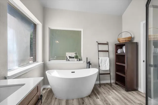 a view of a bathroom with mirror