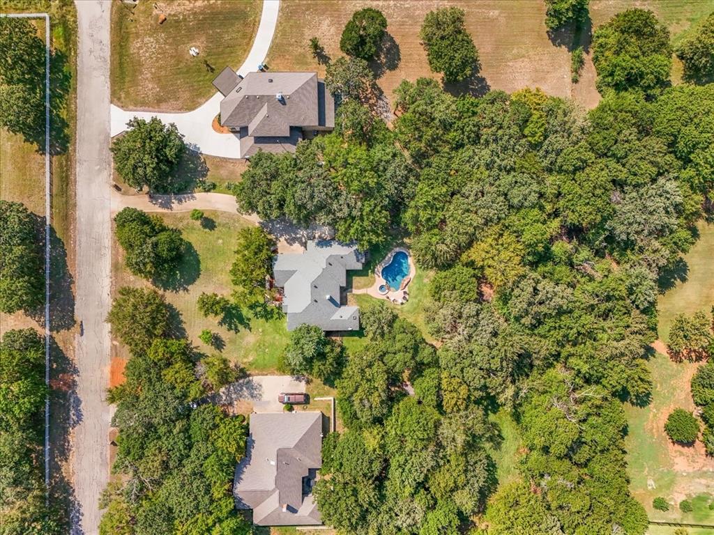 910 Crystal Cove Oak Point, TX 75068 - Photo 38 of 40 an aerial view of a house with a yard