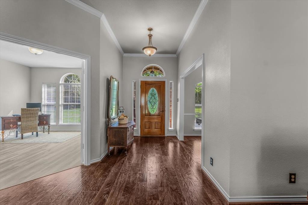 910 Crystal Cove Oak Point, TX 75068 - Photo 7 of 40 a view of an entryway with wooden floor