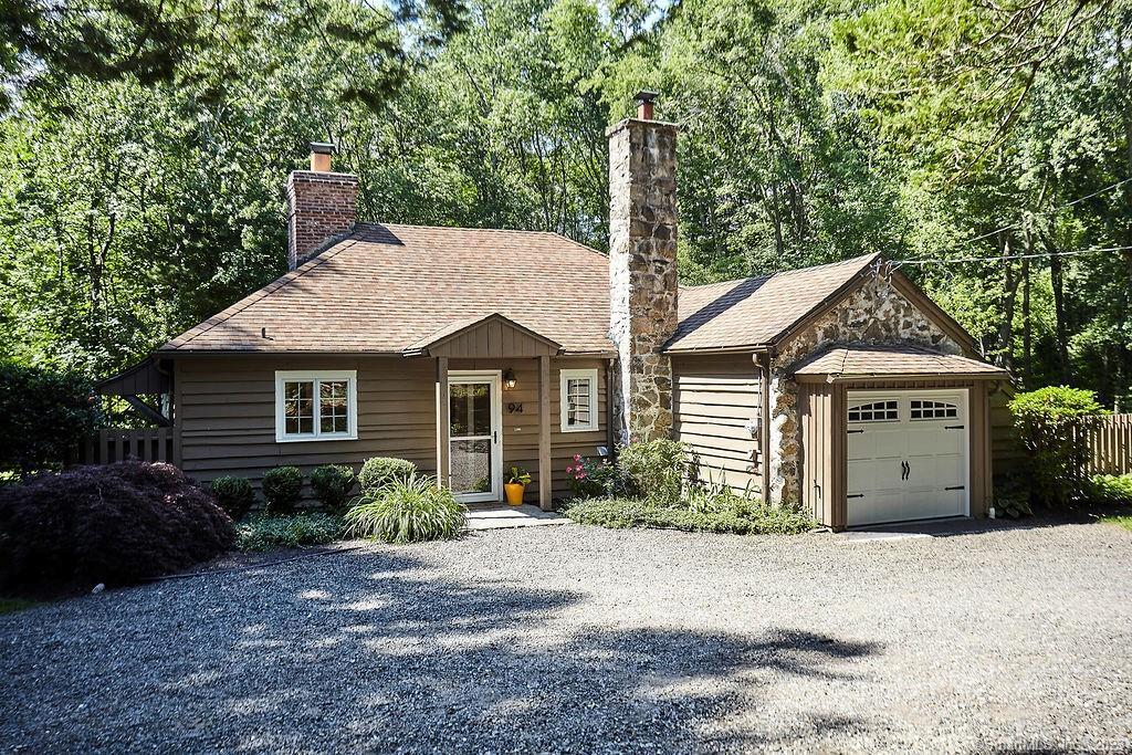 94 Partrick Road Westport, CT 06880 - Photo 2 of 17 a view of a house with a yard and large tree