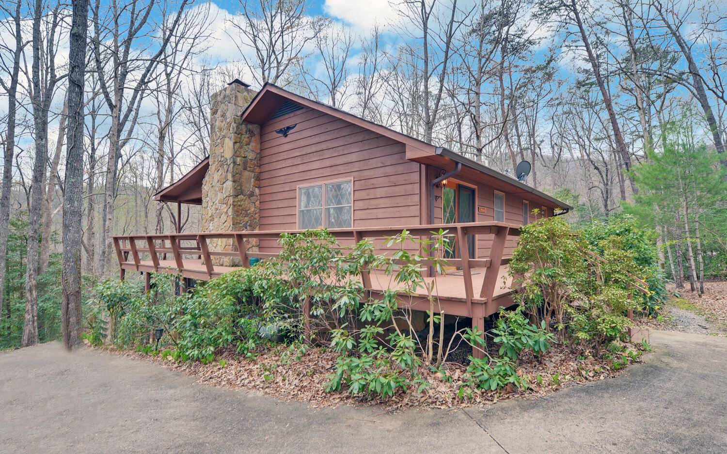 2139 Lake Louisa Road Hiawassee, GA 30546 - Photo 1 of 48 a view of a small yard in front of a house