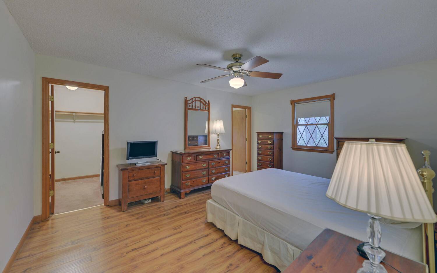 2139 Lake Louisa Road Hiawassee, GA 30546 - Photo 11 of 48 a bedroom with a bed and a flat screen tv