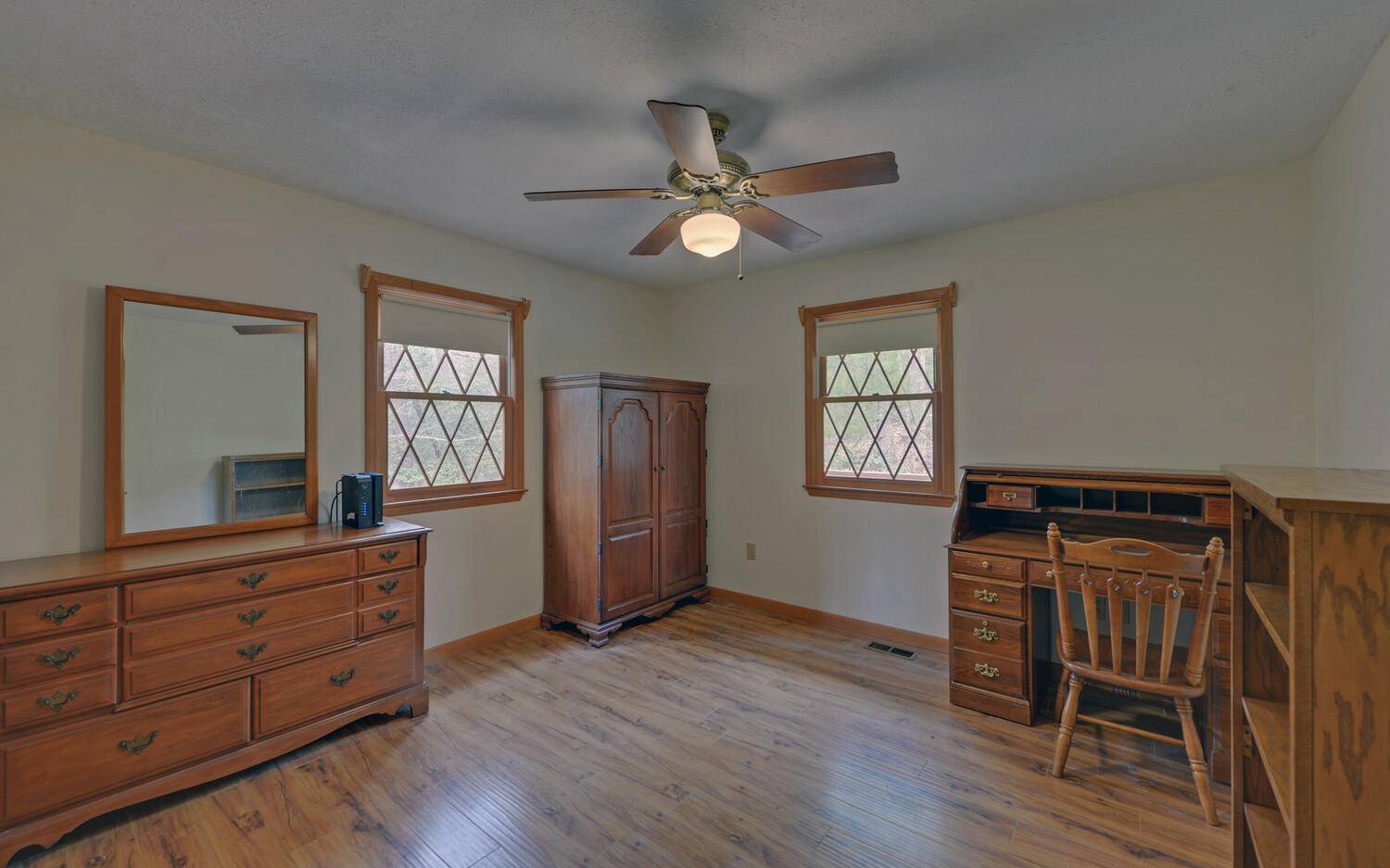 2139 Lake Louisa Road Hiawassee, GA 30546 - Photo 13 of 48 an empty room with wooden floor cabinet and windows