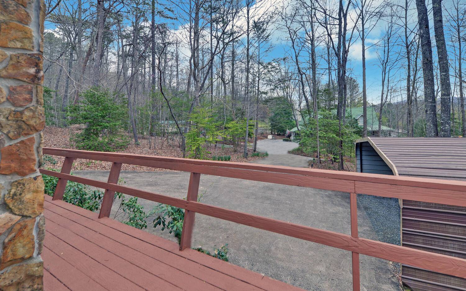 2139 Lake Louisa Road Hiawassee, GA 30546 - Photo 27 of 48 a view of a wooden street from a balcony