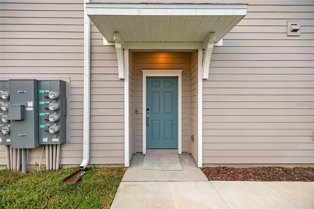 a large kitchen with kitchen island a sink stainless steel appliances and cabinets