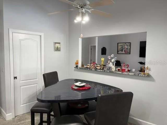 a bathroom with sink and mirror